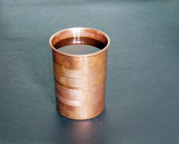 Copper,Cup,On,A,Dark,Background