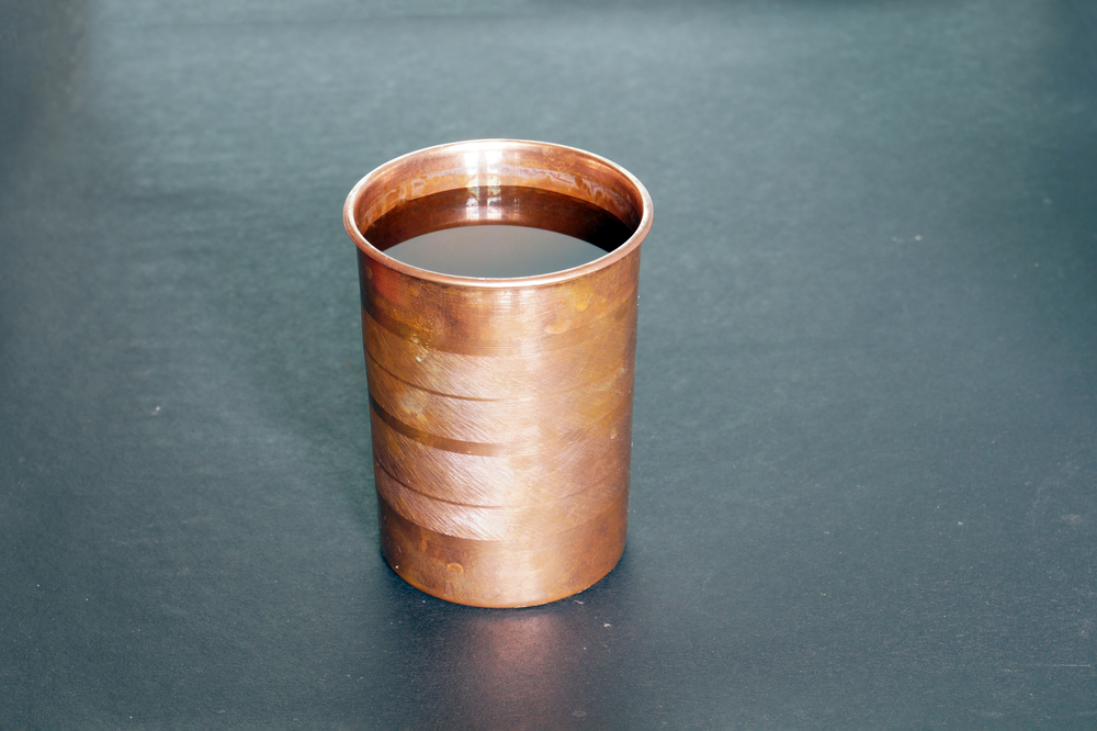 Copper,Cup,On,A,Dark,Background