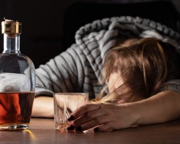 Drunk,Intoxicated,Woman,Sleeping,Near,Whiskey,Glass,,Female,Heavy,Drinker