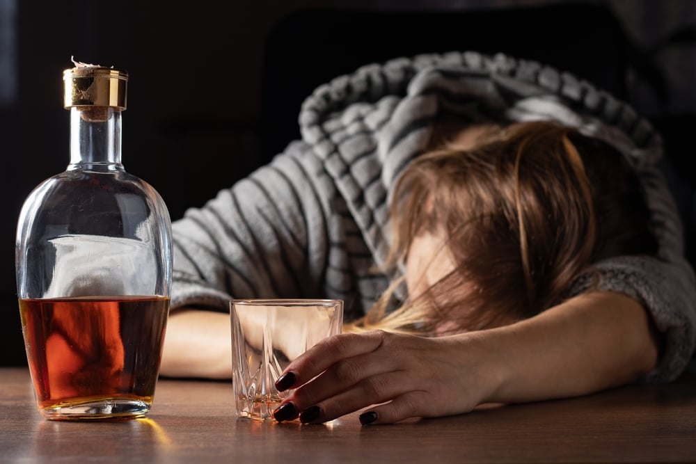 Drunk,Intoxicated,Woman,Sleeping,Near,Whiskey,Glass,,Female,Heavy,Drinker