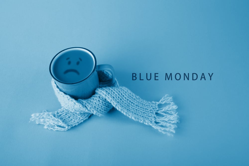 Blue,Cup,With,Scarfcoffee,On,Blue,Background.,Blue,Monday,Concept