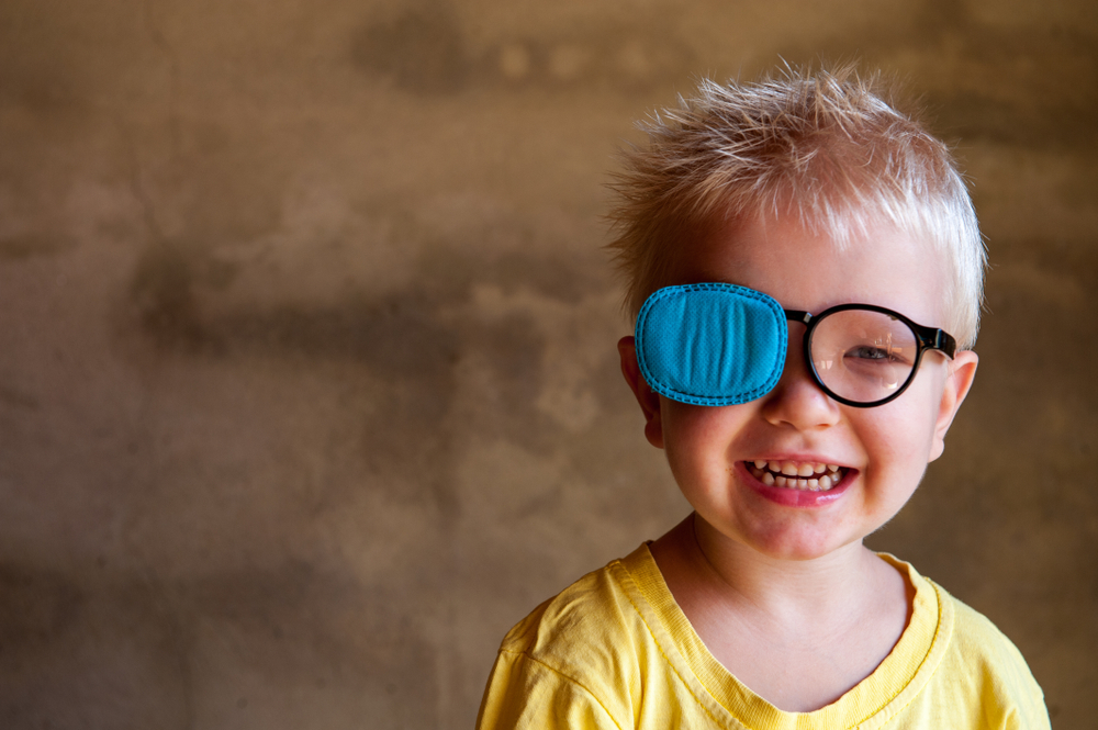 Portrait,Of,Funny,Child,In,New,Glasses,With,Patch,For