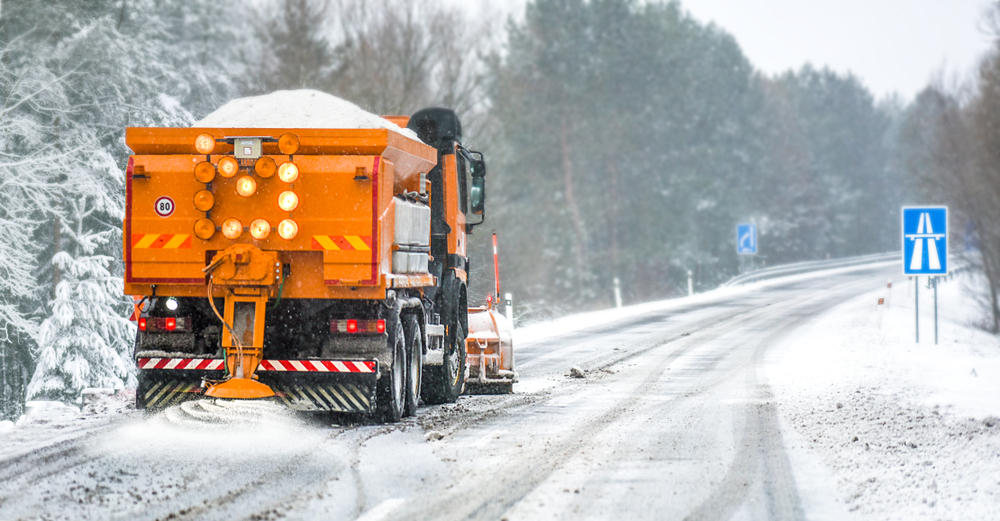 Snow,Plow,On,Highway,Salting,Road.,Orange,Truck,Deicing,Street.