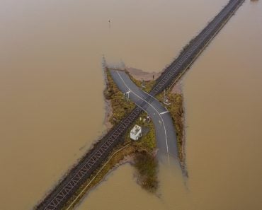 Flooding,Germany,.flooded,Road,Passing,Through,The,Railway.,A,Road