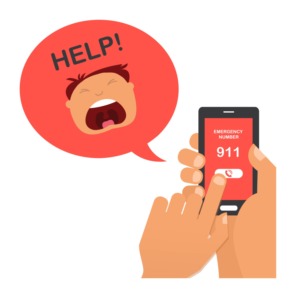 hand press emergency number 911 on a mobile phone