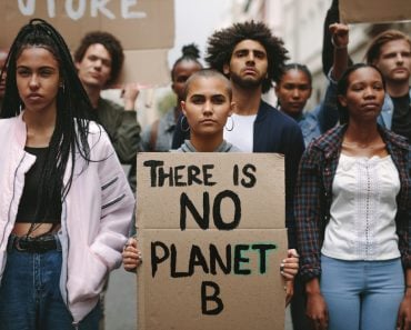 Group,Of,Activists,With,Banners,Protesting,Over,Pollution,And,Global