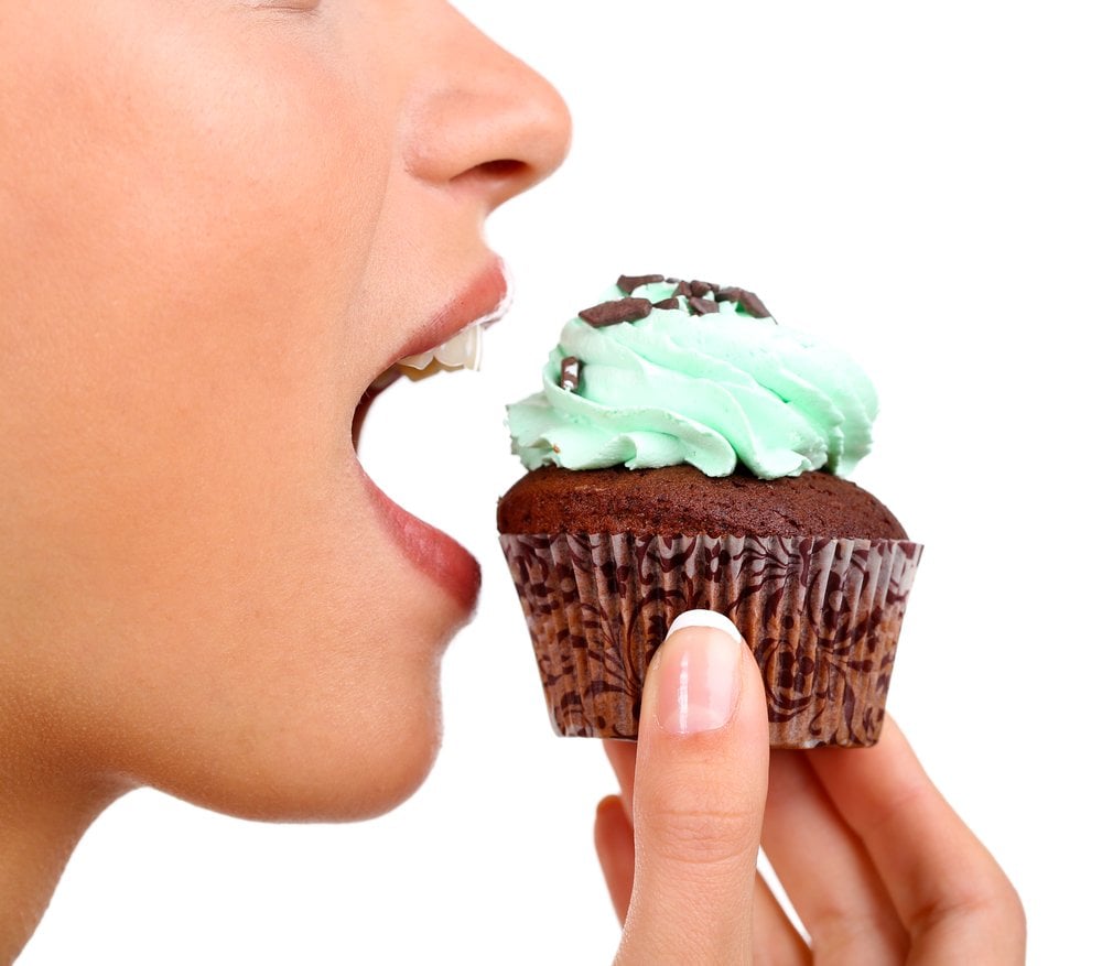Woman Eating Cupcake