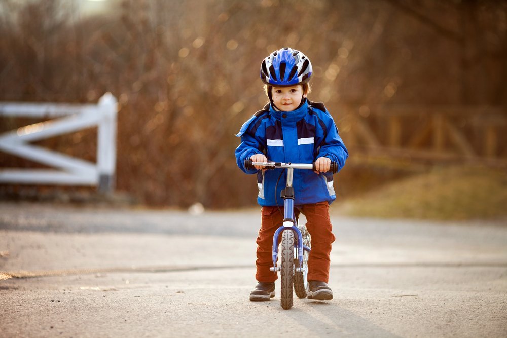 kid riding bicycle