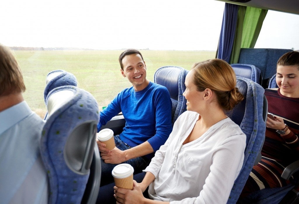 This guy probably wouldn’t look so upbeat if he were to sit in the same seat for 10 hours or more, thanks to the tiredness that almost feels inherent on such long road journeys. (Credit: Syda Productions/fotolia.com)