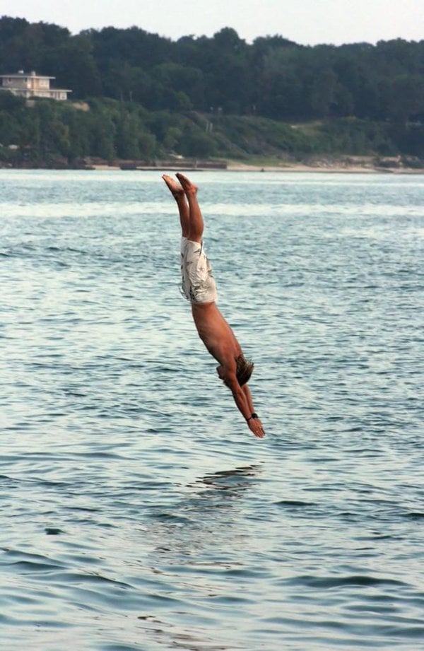 diving into water head-first position 