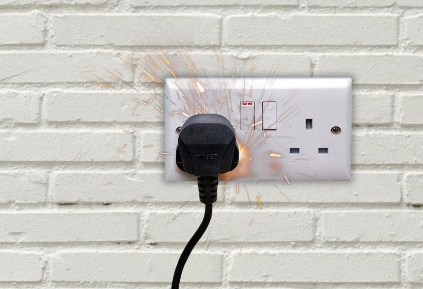 Spark Double electrical power socket and plug switched on