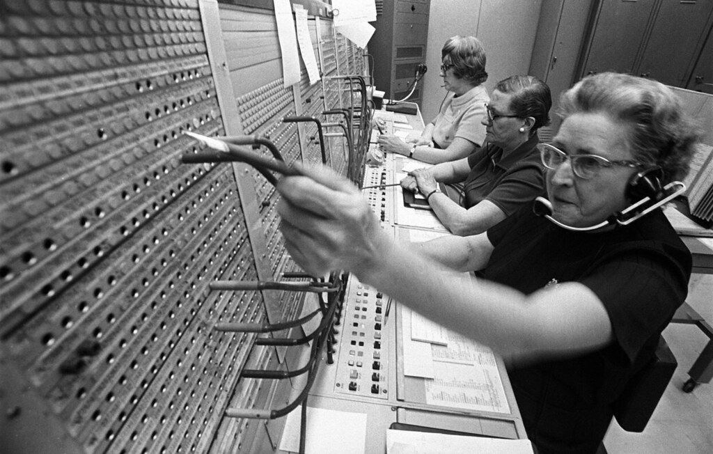 operator using an old fashioned switchboard