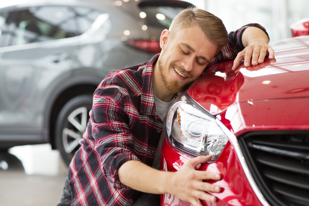 smiling joyfully with his eyes closed copyspace happiness love travelling vehicle automotive transport. - Image( Zoriana Zaitseva)S