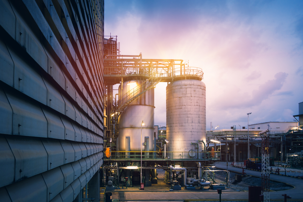 Chemical tanks in petrochemical industry plant or Reactor for chemical reaction in factory with blue sky sunset background - Image(manine99)s