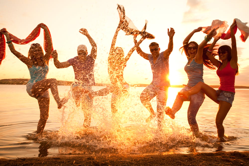 Large group of young people enjoying a beach party - Image(YanLev)S