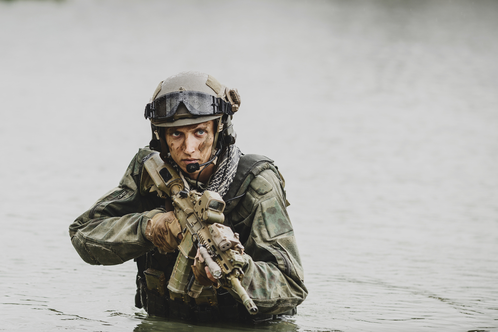 Portrait of a ranger in the battlefield with a rifle - Image(PRESSLAB)s