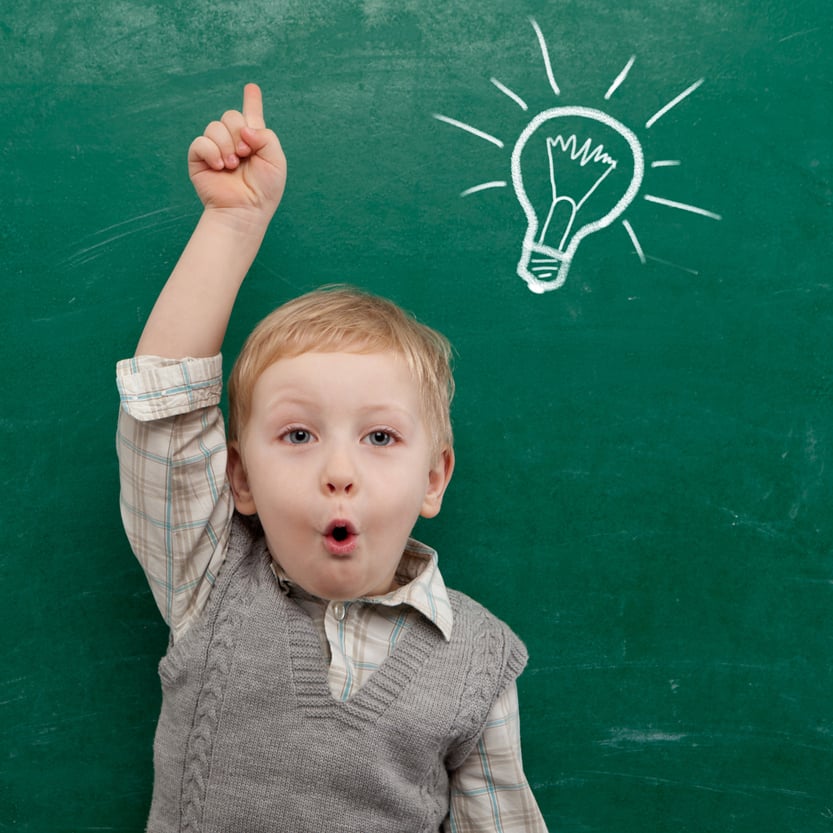 Cheerful smiling child at the blackboard(YuryImaging)s