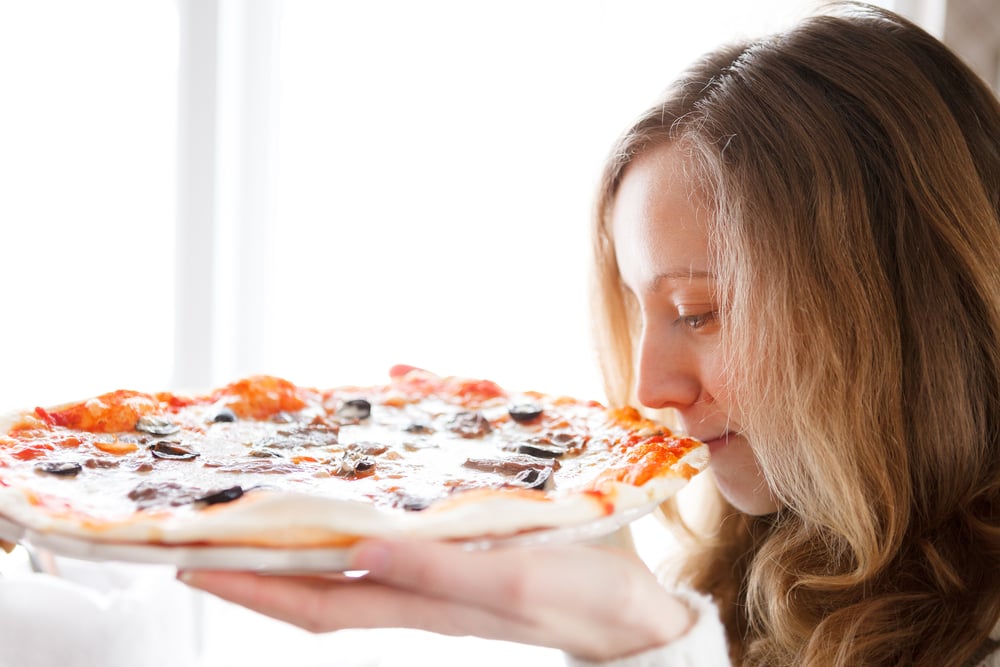 Beautiful girl with pizza(OLEKSANDR SHEVCHENKO)s