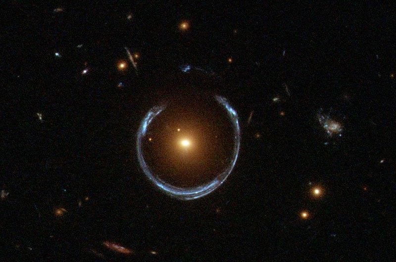 A Horseshoe Einstein Ring from Hubble