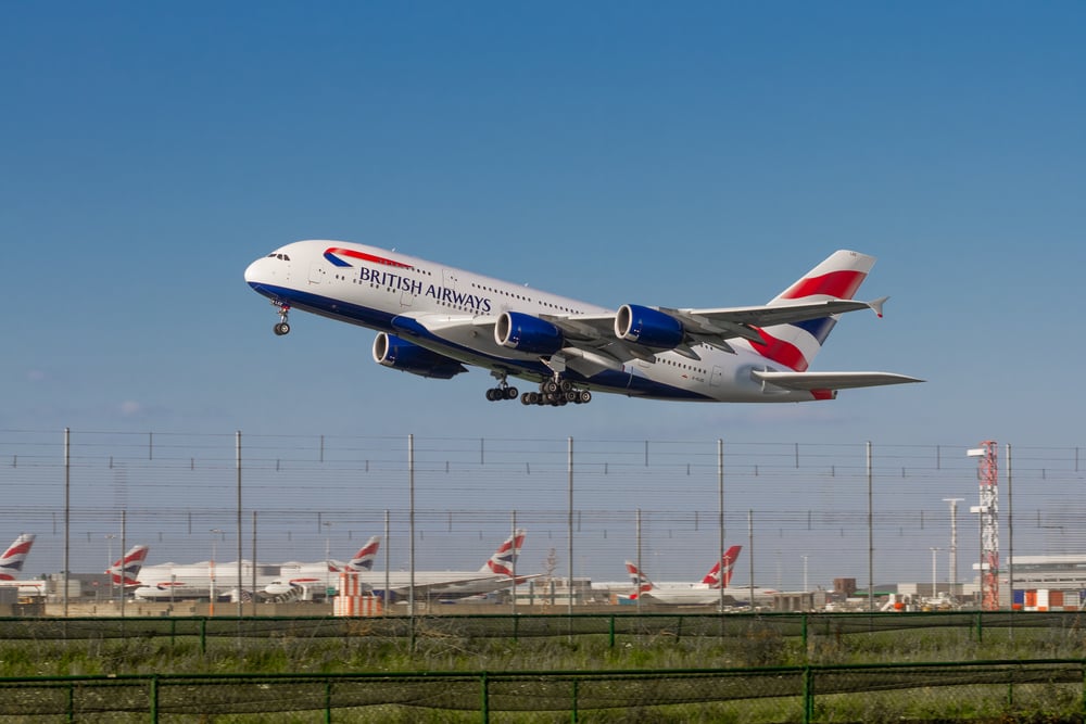 British Airways Airbus A380 taking off from LHR Runway 09R right past parked planes(Abdul N Quraishi - Abs)s