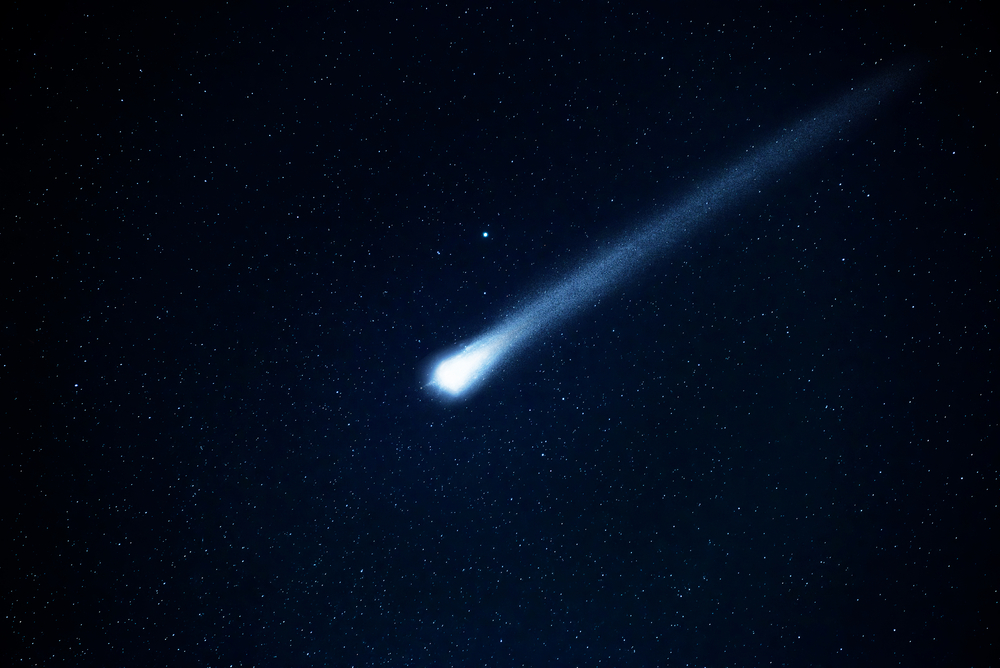 Comet in the starry sky. Elements of this image furnished by NASA(Triff)S