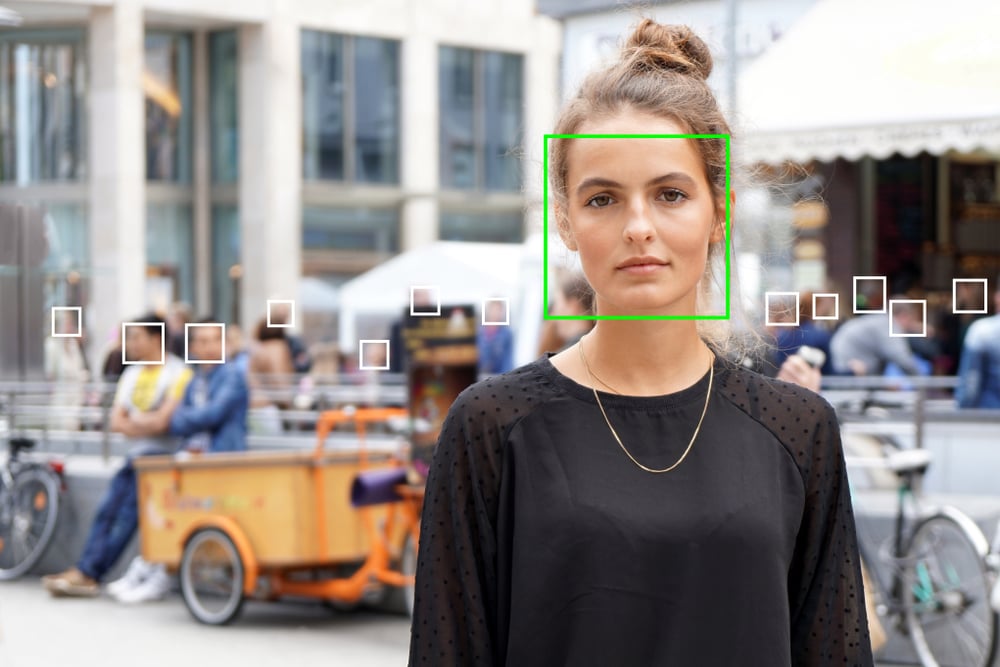 Young,Woman,Picked,Out,By,Face,Detection,Or,Facial,Recognition