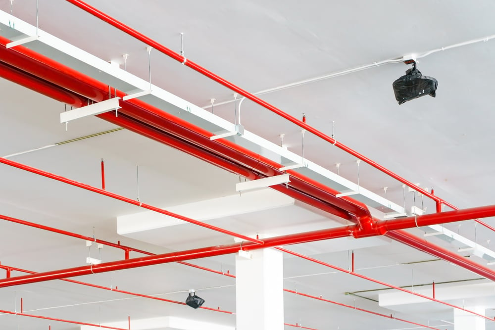 Fire,Sprinkler,System,With,Red,Pipes,Is,Placed,To,Hanging