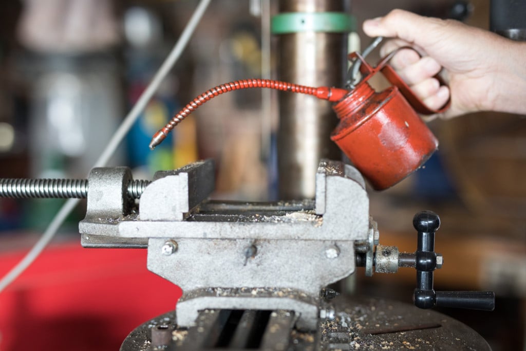 view-of-metal-clamp-coated-covered-with-wood-chips-dust-sawdust-in-a-workshop-garage-used-to-grip_t20_jL1voN (1)