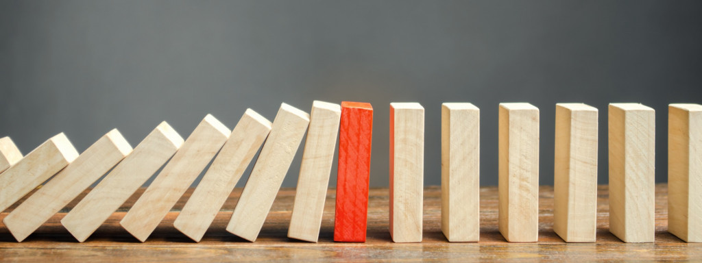 wooden-blocks-and-the-effect-of-dominoes-risk-management-concept-successful-strong-business-and_t20_8dyjzj