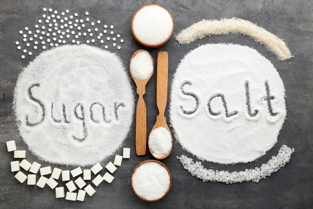 Inscription,Sugar,And,Salt,On,Grey,Wooden,Table