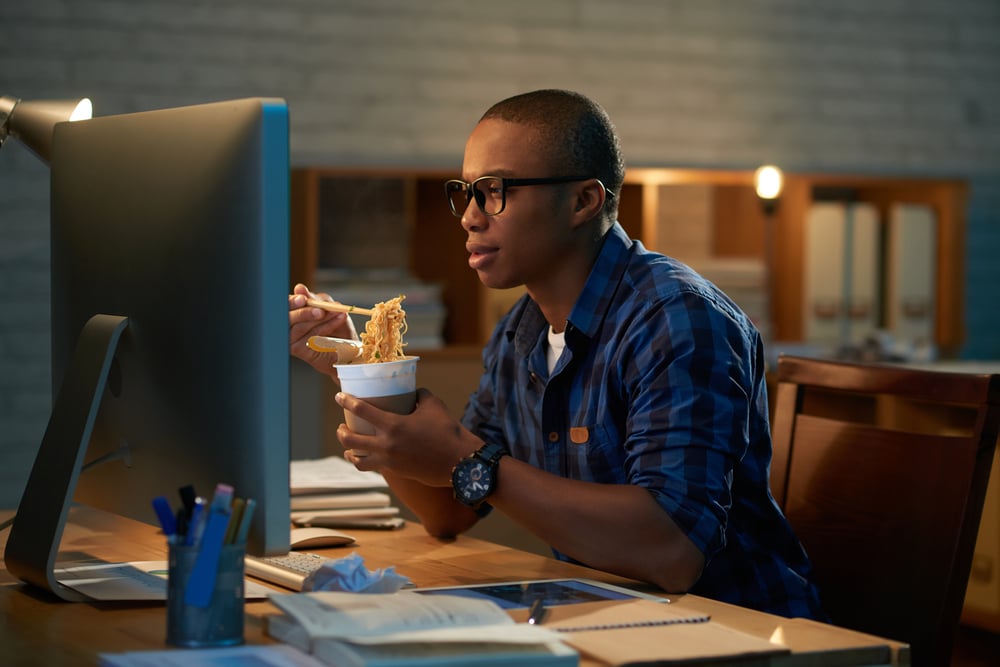 Profile,View,Of,Handsome,Young,Man,Eating,Instant,Noodles,With