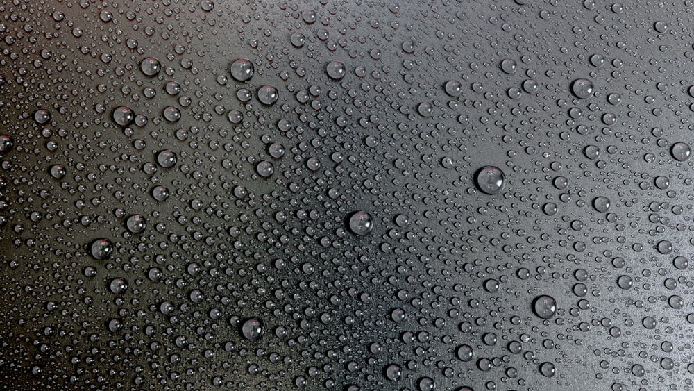 Water,Drops,Rain,Or,Droplet,On,Black,Background.,Condensation,Is