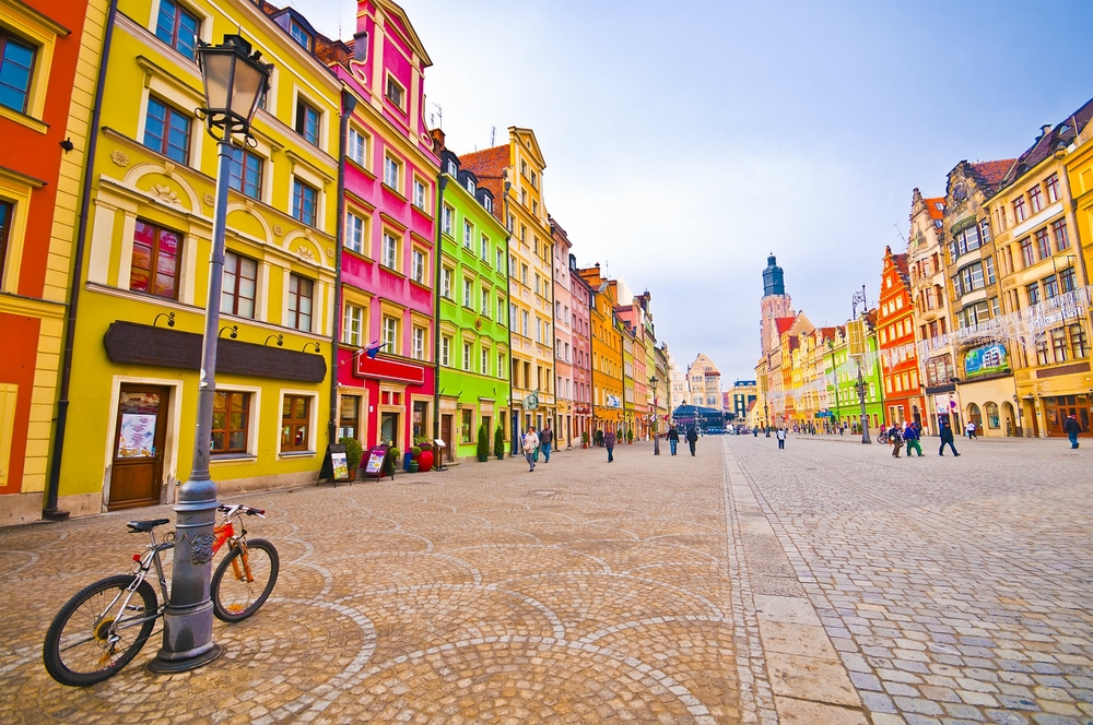 A street through a colorful city.