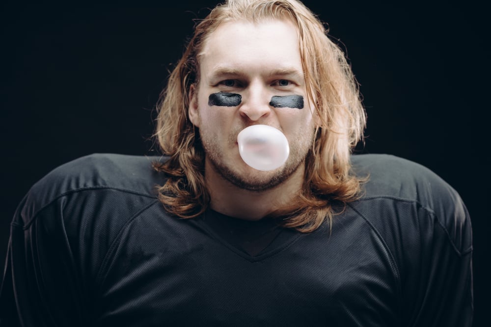 Face,And,Shoulder,Portrait,Of,Confident,American,Football,A,Prolific