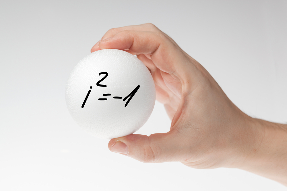 Man's,Hand,Holding,White,Blank,Styrofoam,Ball,With,Handwritten,Imaginary