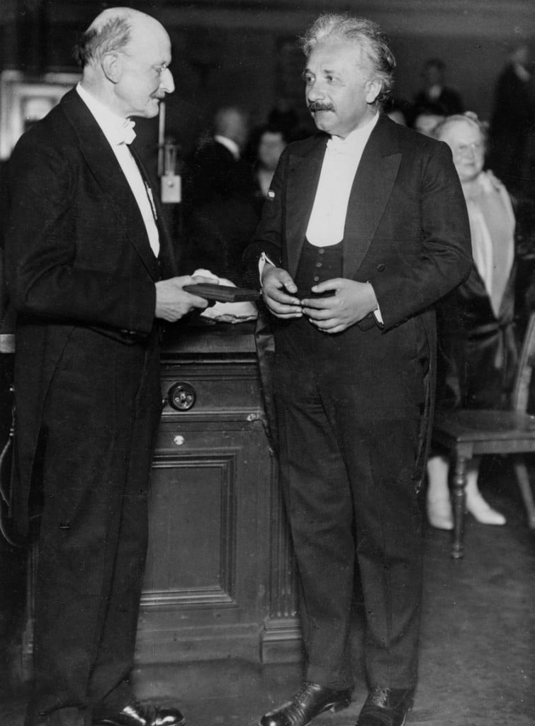 Quantum-optics-pioneers-Max-Planck-and-Albert-Einstein-in-1929-Einstein-is-receiving