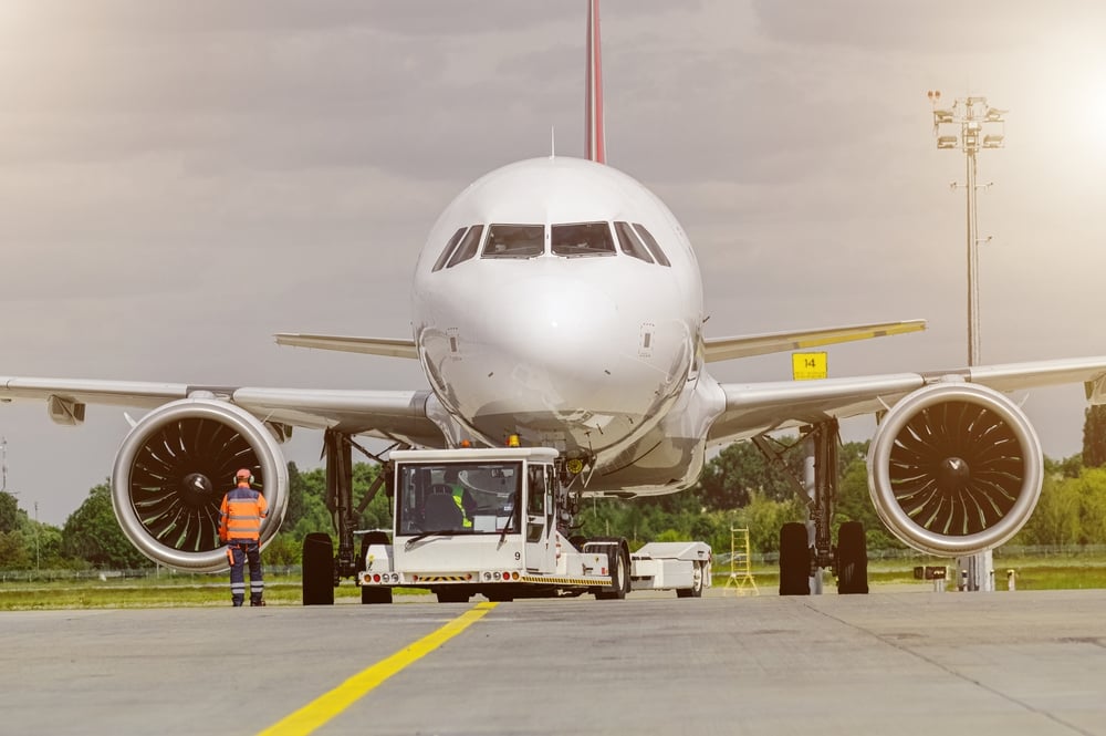 Ground,Operations,At,Airport,Apron.,Runway,Operations,Against,Blue,Sky