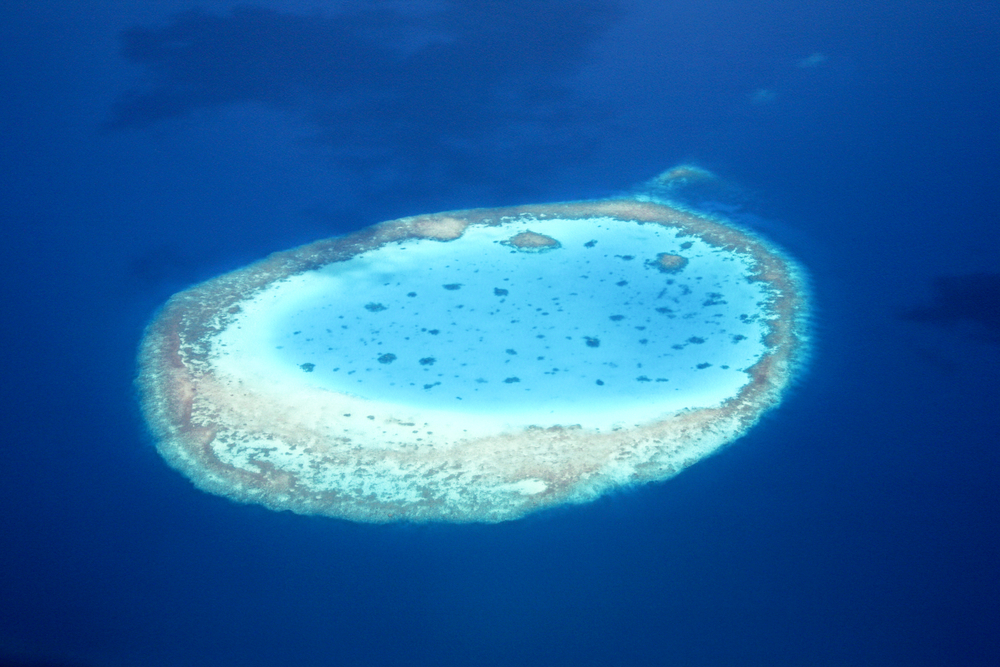 Aerial,View,Of,An,Atoll,In,The,Azure,Blue,South