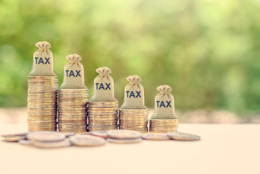 Government,Income,Tax,Collection,Concept,:,Tax,Burlap,Bags,On