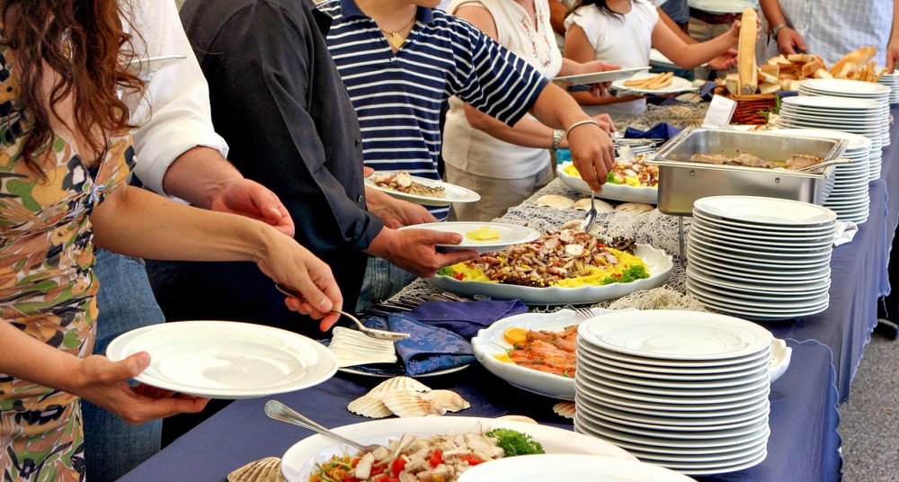 People,Serving,Themselves,At,A,Buffet,,Food,Concept