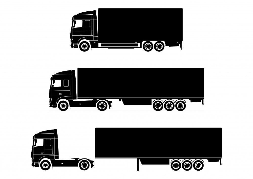 Truck icon. Silhouette of a modern truck on a white background. Flat vector.