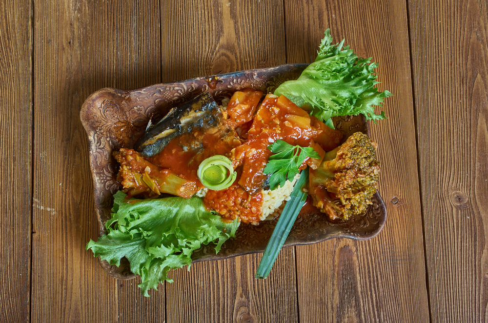 Coo-Coo and Flying Fish, national dish of Barbados, cornmeal and okra porridge