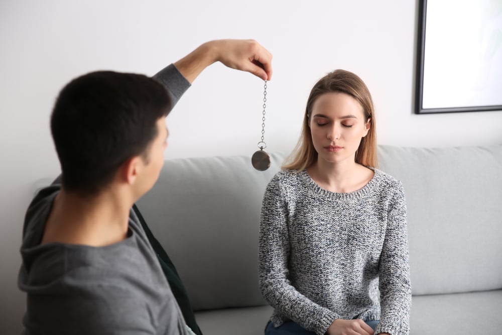 Young,Woman,During,Hypnosis,Session,In,Psychologist's,Office