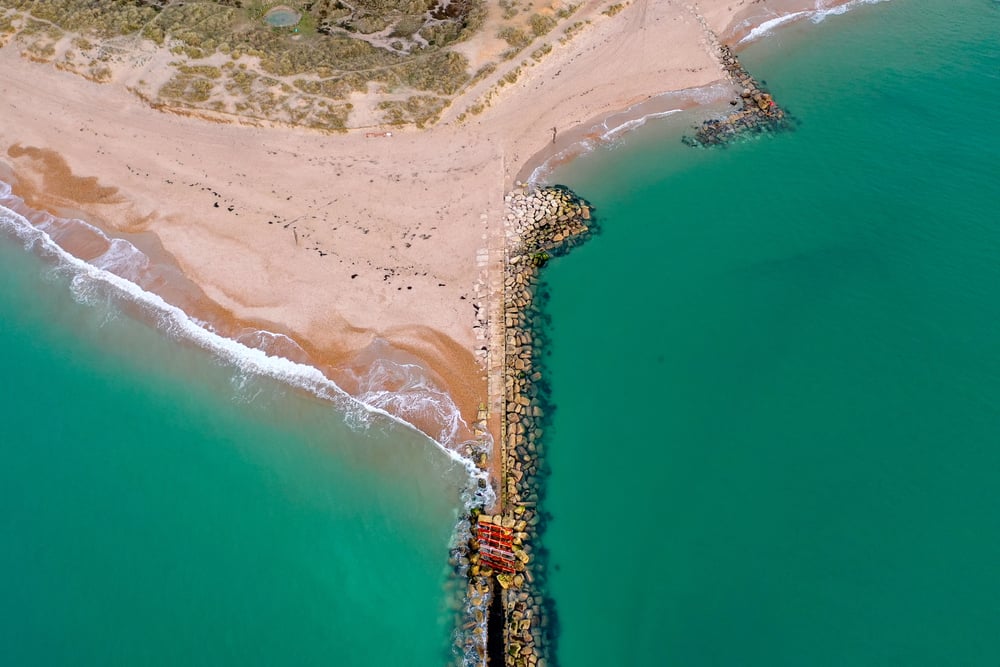 A,Birdeye,View,Of,A,Groyne,Down,On,A,Uk