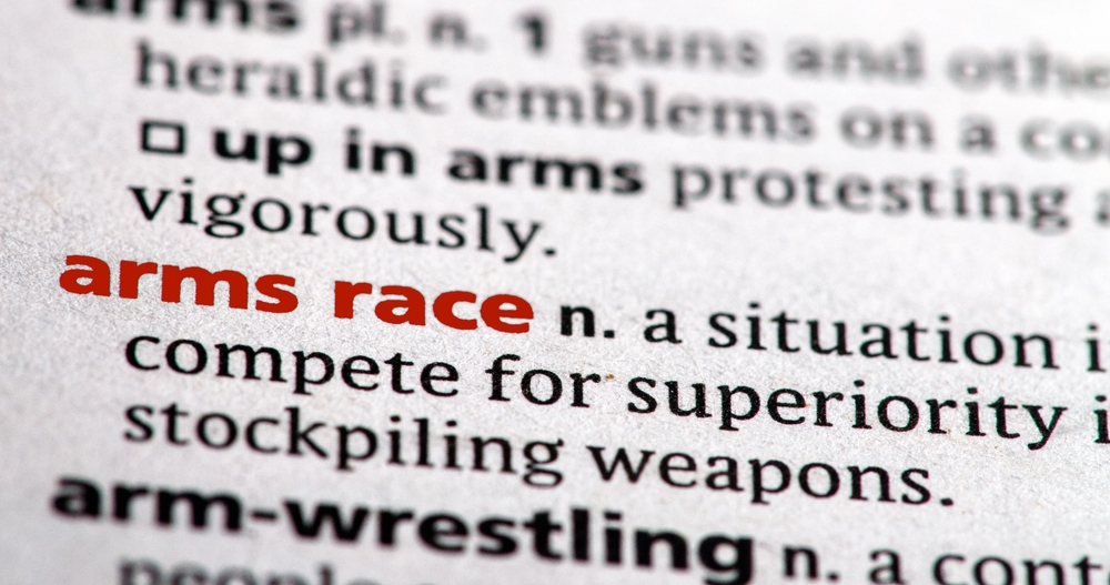 Close,Up,Photo,Of,The,Words,Arms,Race