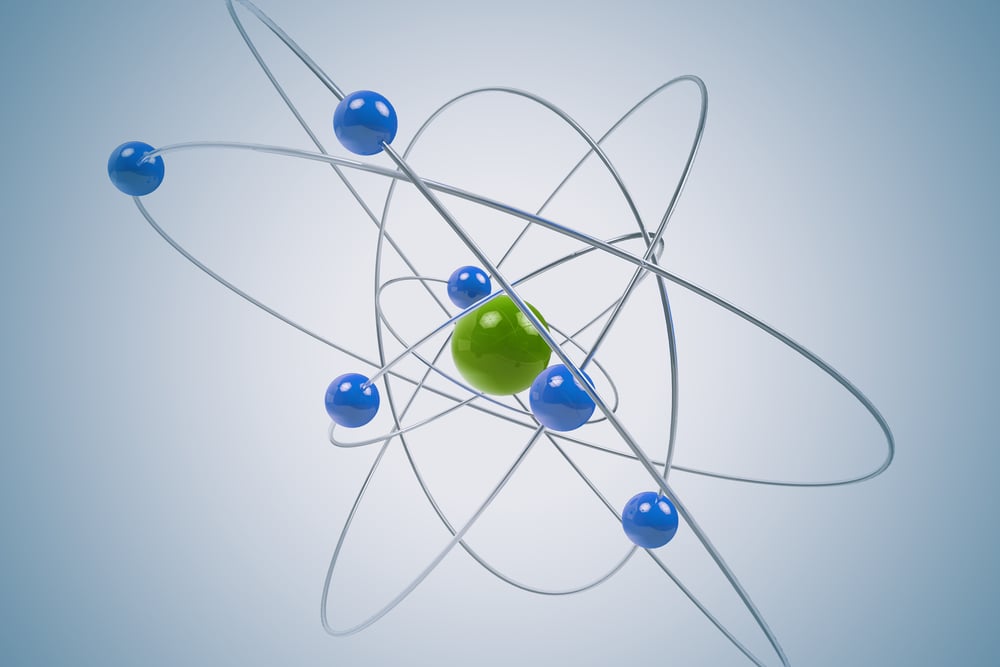 Isolated,3d,Atom,Model,With,Green,And,Blue,Particles.,The